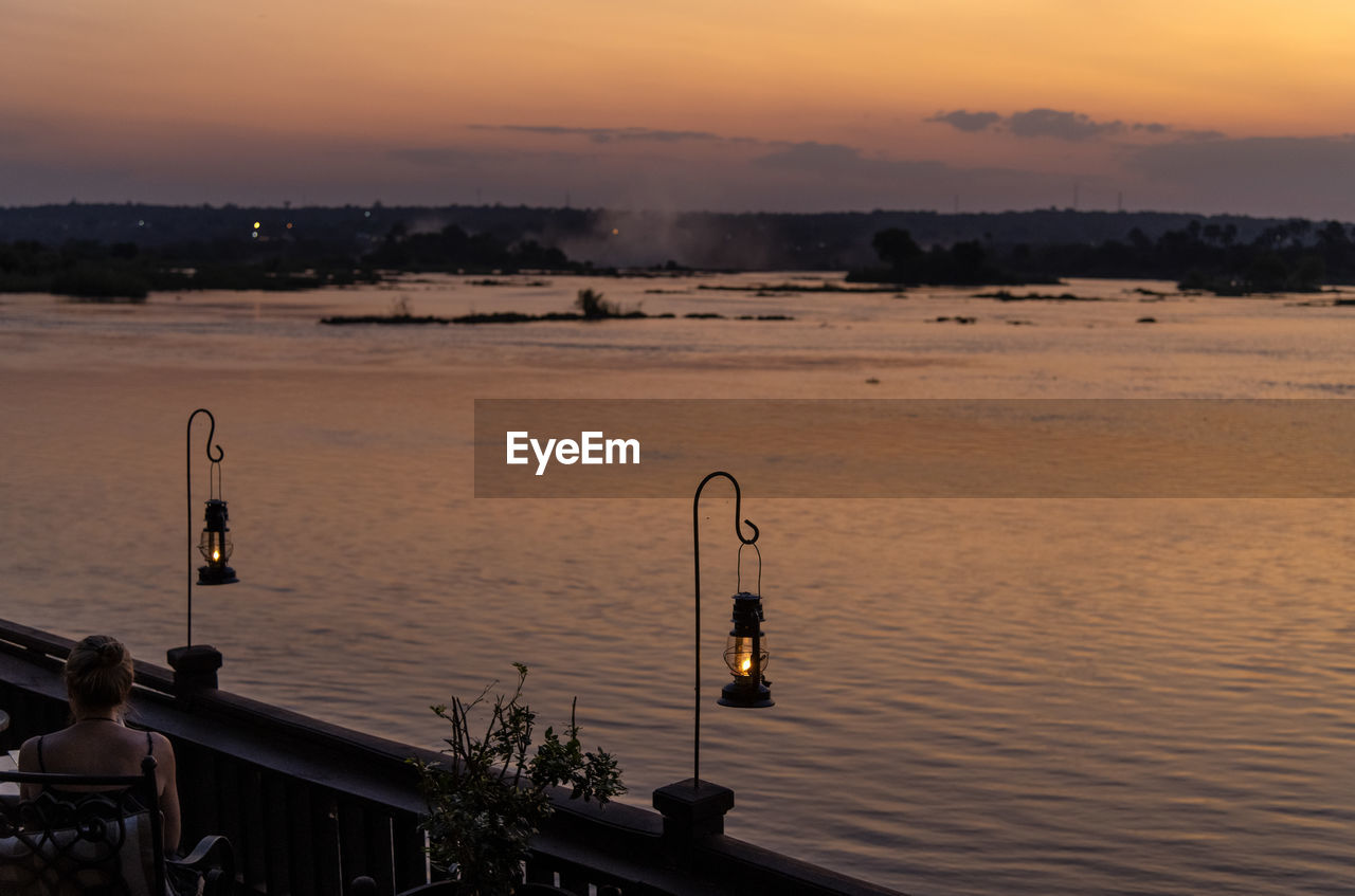 Scenic view of sea against sky at sunset