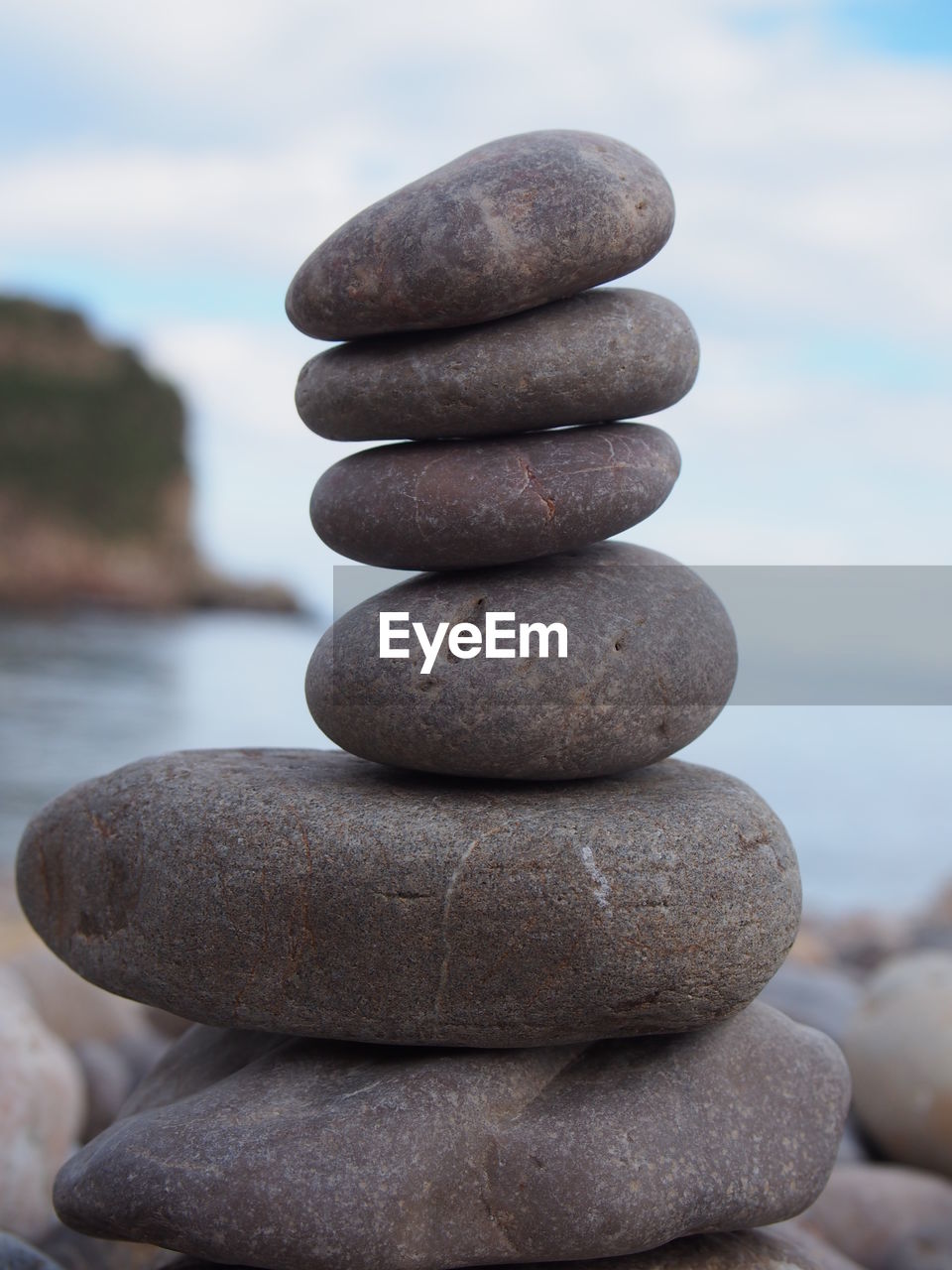 CLOSE-UP OF STONE STACK ON PEBBLES