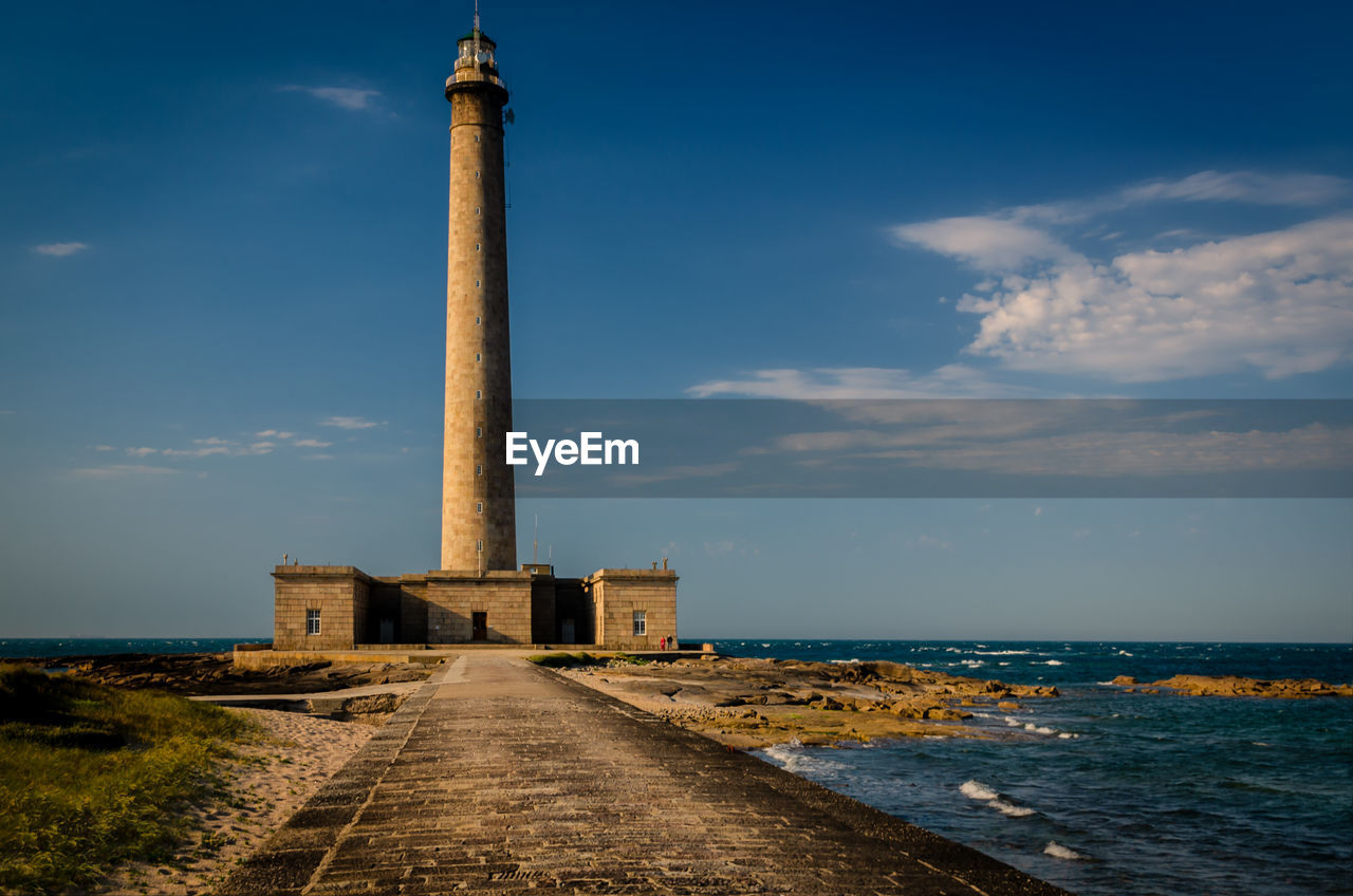 VIEW OF TOWER ON SEA