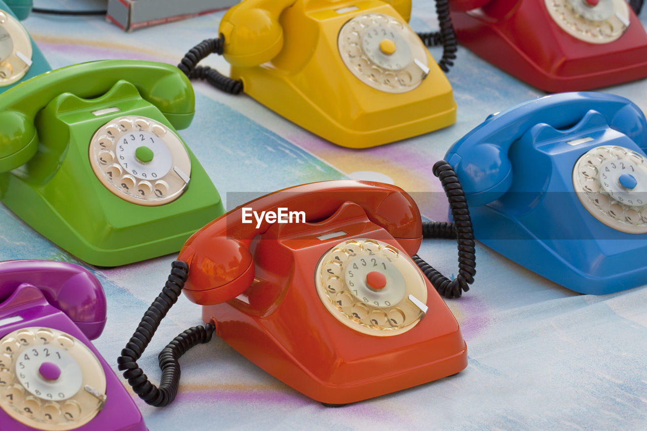 Close-up of old telephone on table