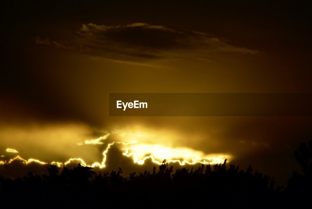 LOW ANGLE VIEW OF DRAMATIC SKY AT NIGHT