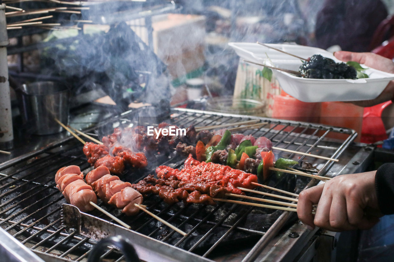FOOD ON BARBECUE GRILL