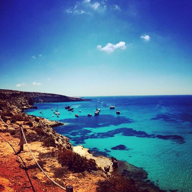 VIEW OF BOATS IN SEA