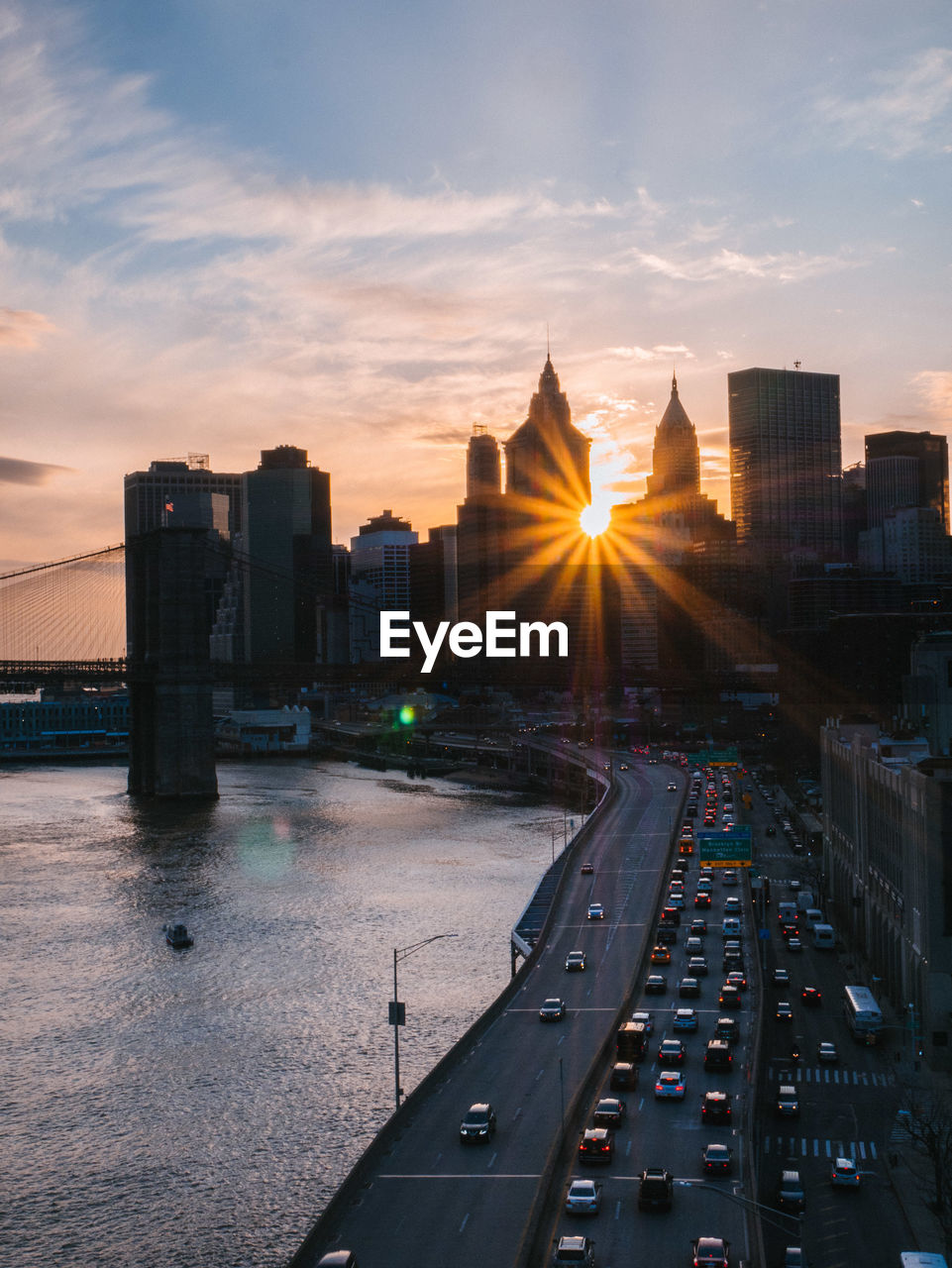 Cityscape against sky during sunset