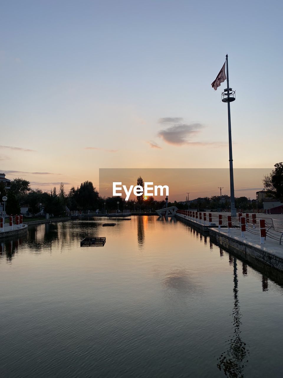 SCENIC VIEW OF LAKE DURING SUNSET