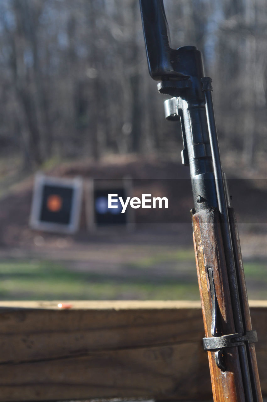 Mosin nagant rifle gun with the bayonet attached at a shooting range