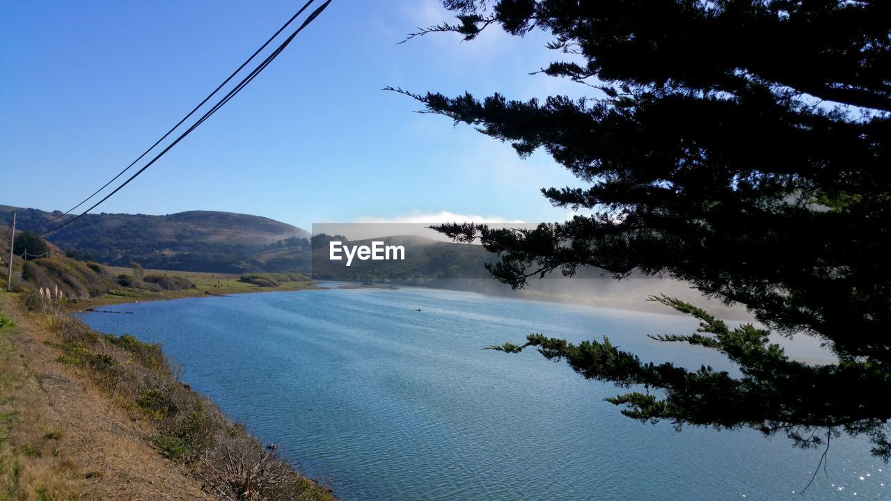 Fog over river. russian river meets pacific ocean. misty blue.