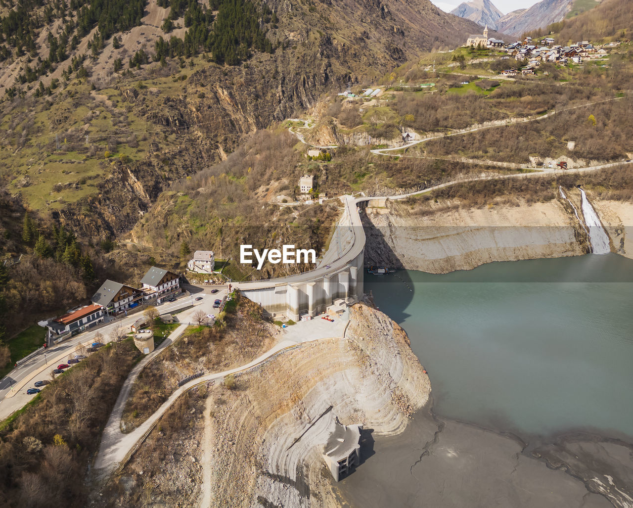 Panoramic drone shot of low water on lac chambon in french alps