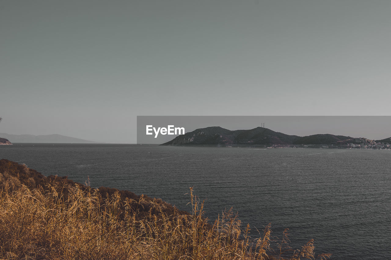 VIEW OF SEA AGAINST CLEAR SKY