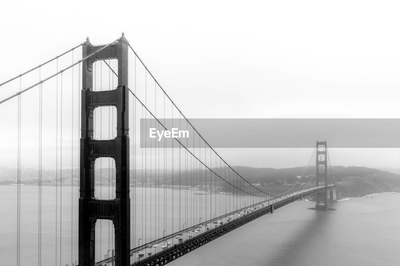 Golden gate bridge over bay against sky