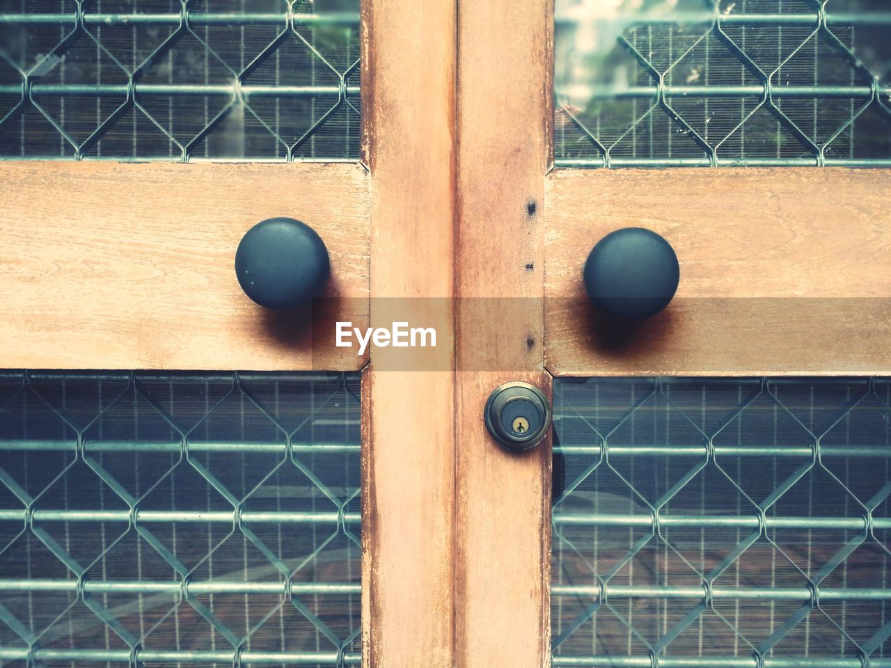 FULL FRAME SHOT OF WINDOW WITH BALL AND CURTAIN