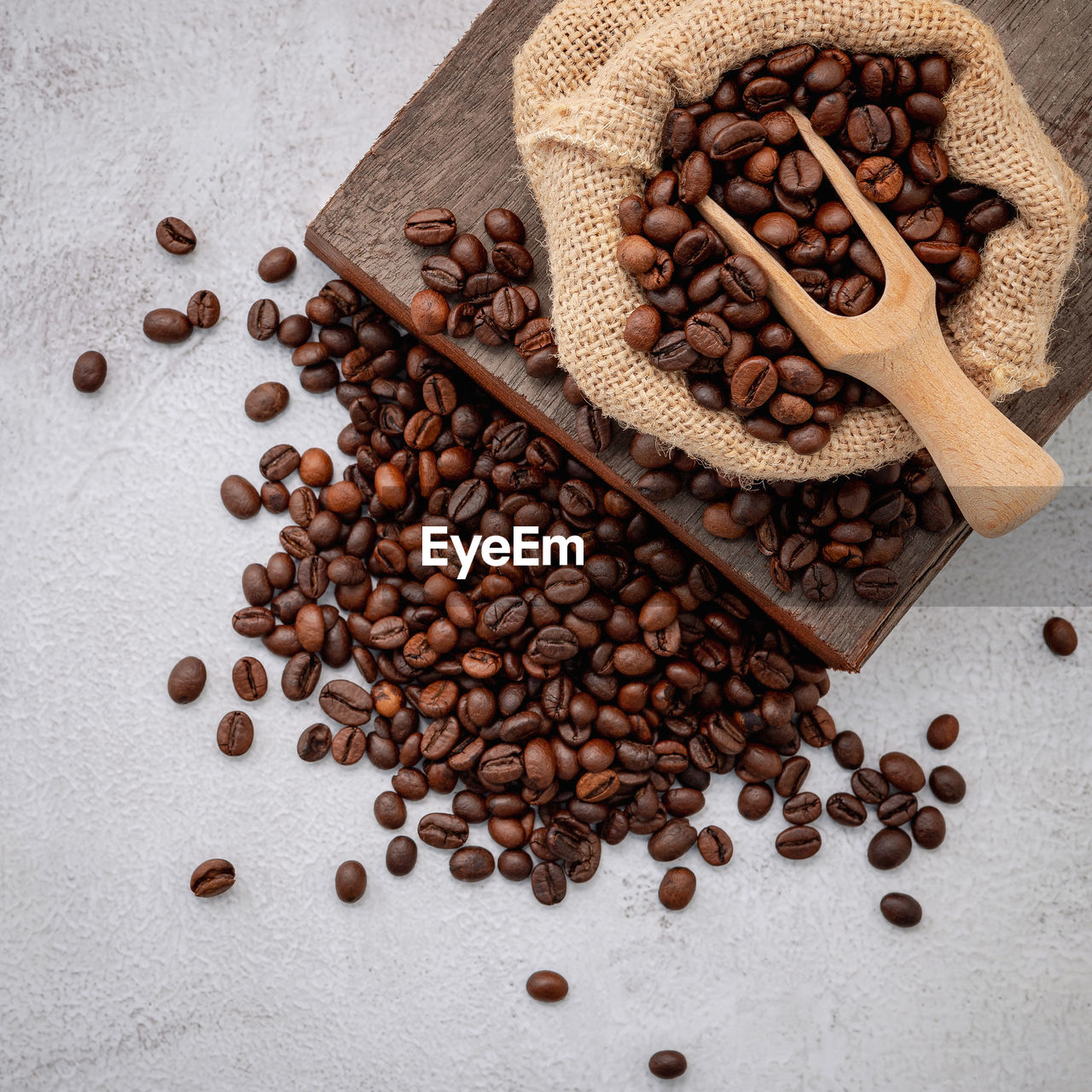 directly above shot of roasted coffee beans on table