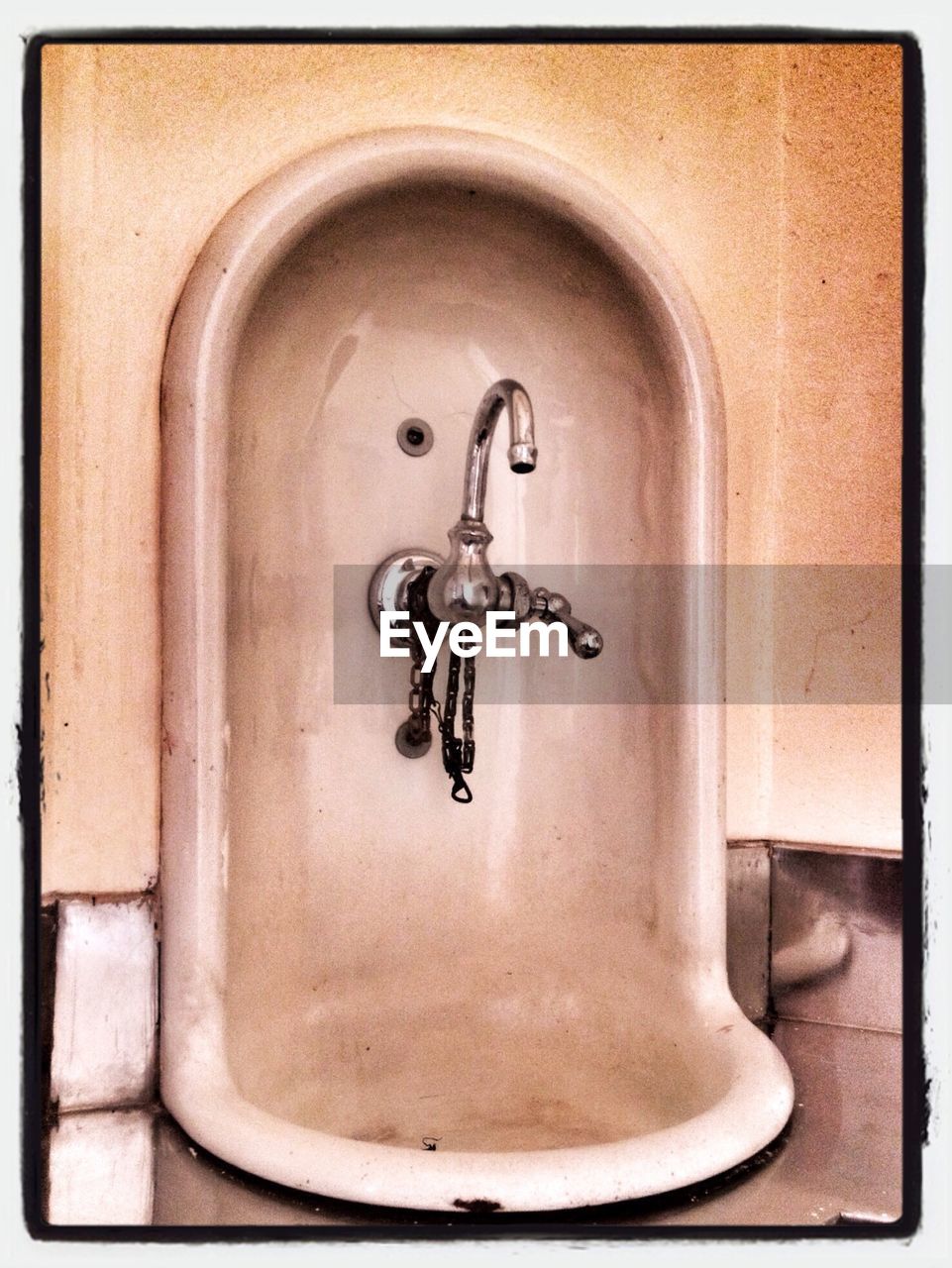 Close-up of a sink with gooseneck faucet