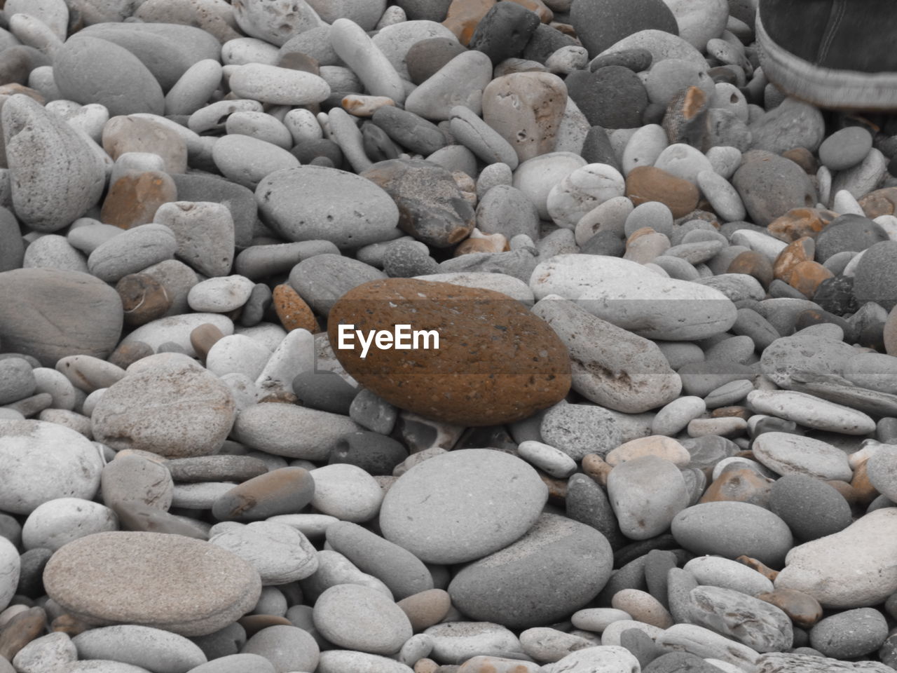 Full frame shot of pebbles on beach