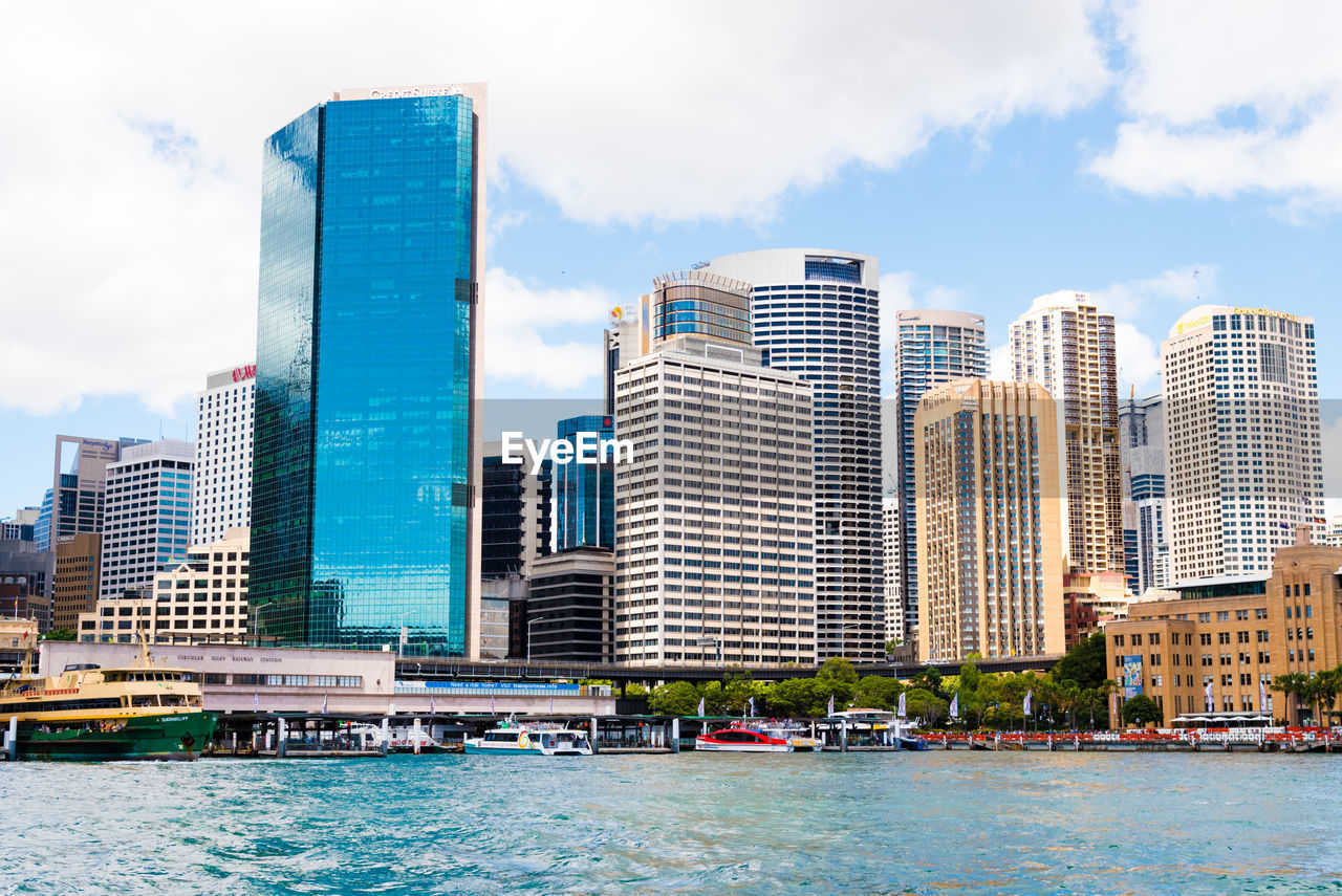 Modern buildings in city against sky