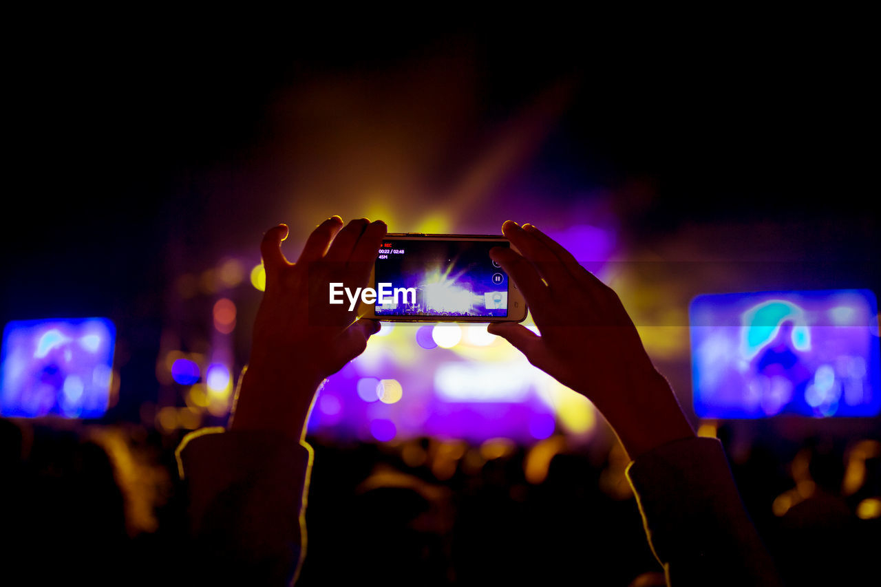 PEOPLE ENJOYING MUSIC CONCERT