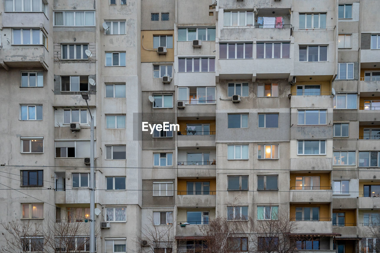 LOW ANGLE VIEW OF RESIDENTIAL BUILDING