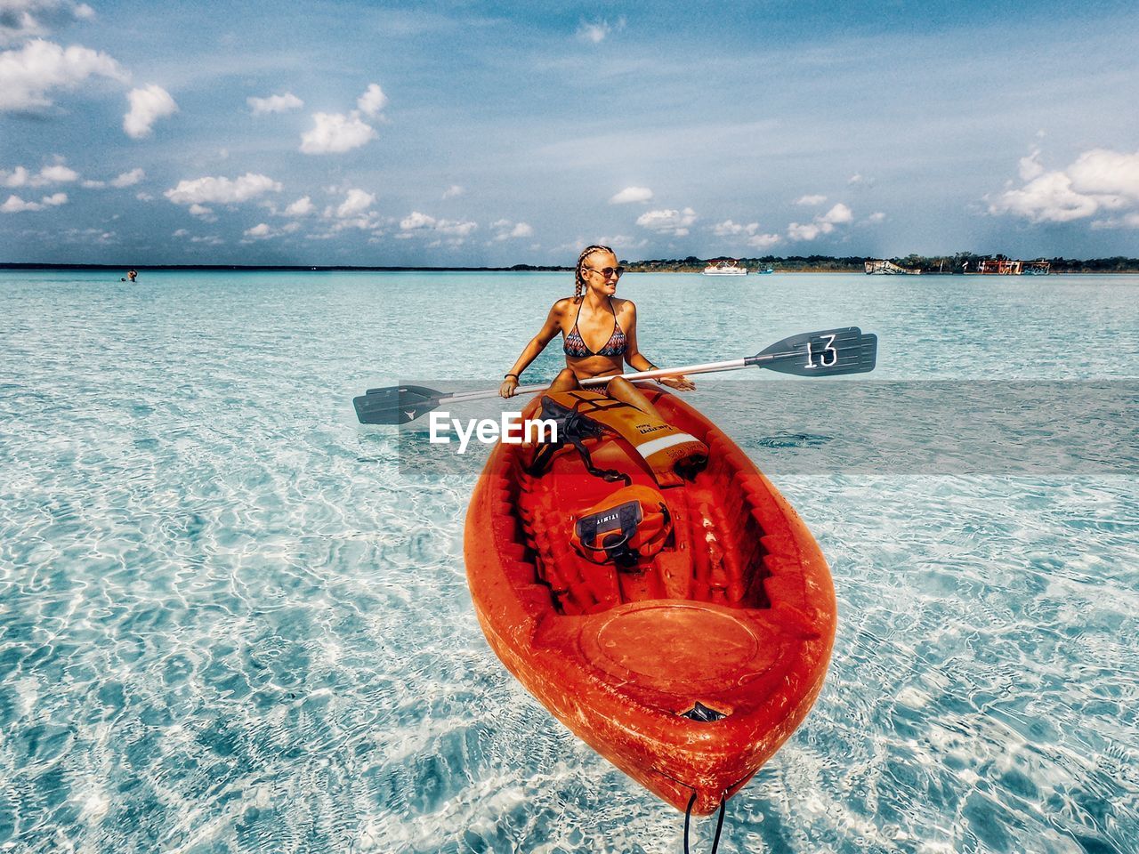 PORTRAIT OF MAN ON BOAT AGAINST SEA