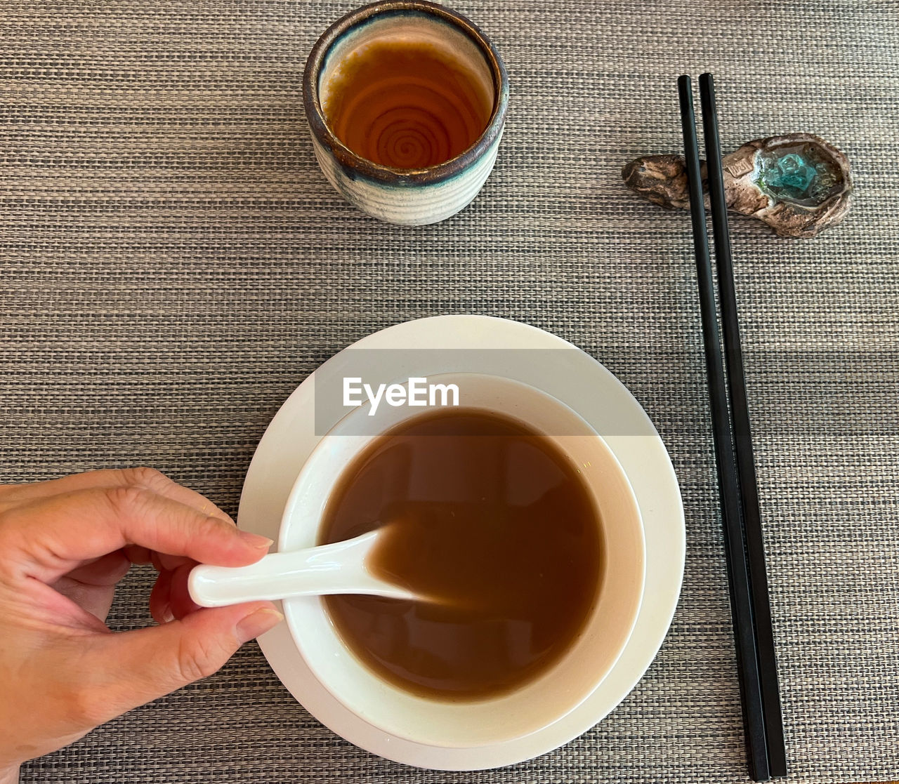 High angle view of scooping soup on table