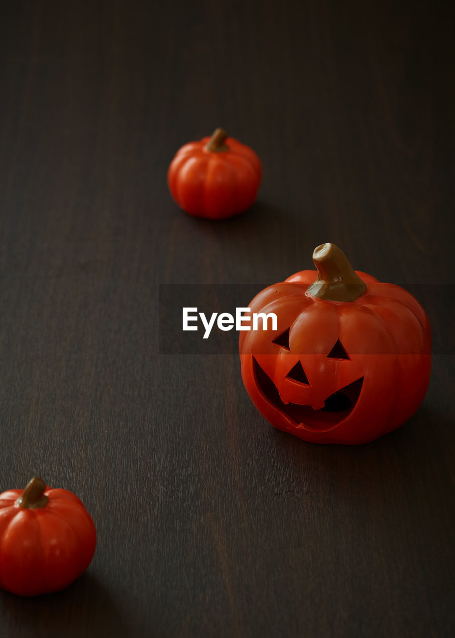 Halloween pumpkin on old wooden background