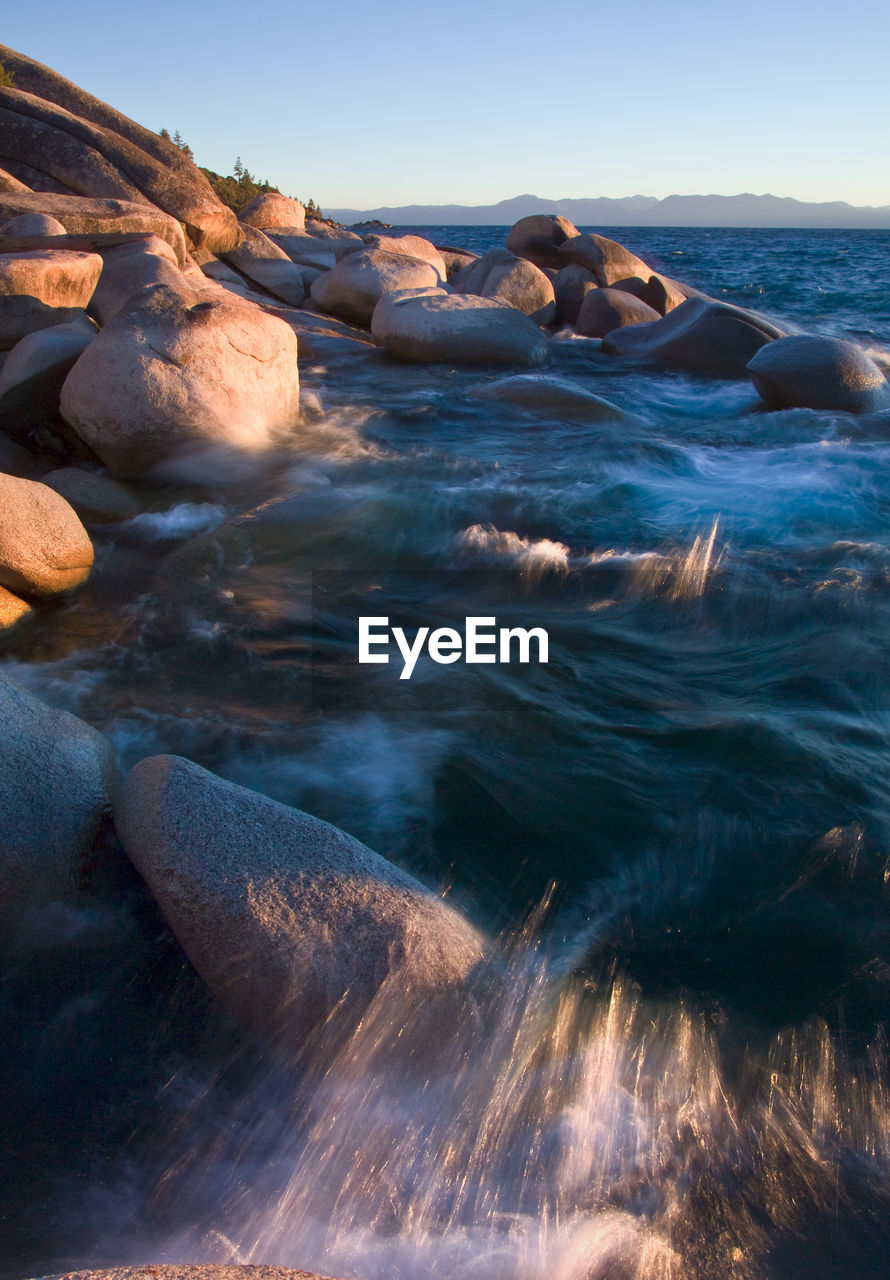 Scenic view of sea against clear sky