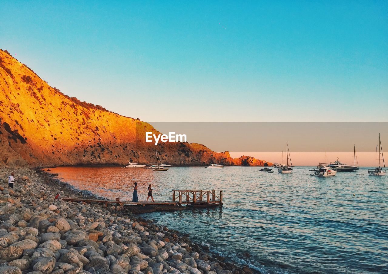 Scenic view of sea against clear sky