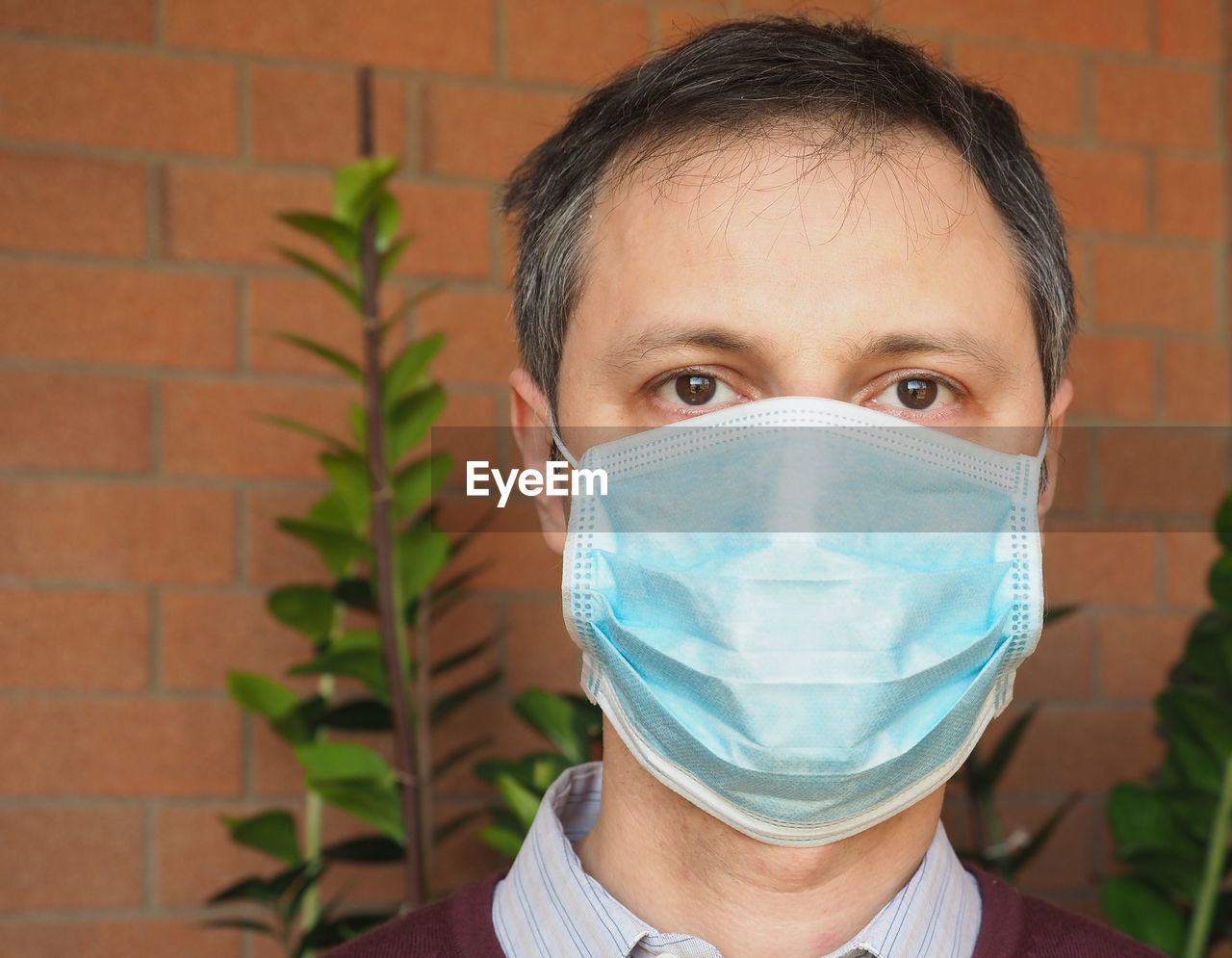 Close-up of man wearing mask