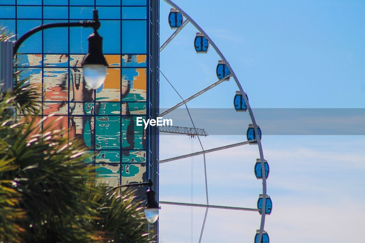 LOW ANGLE VIEW OF AMUSEMENT PARK