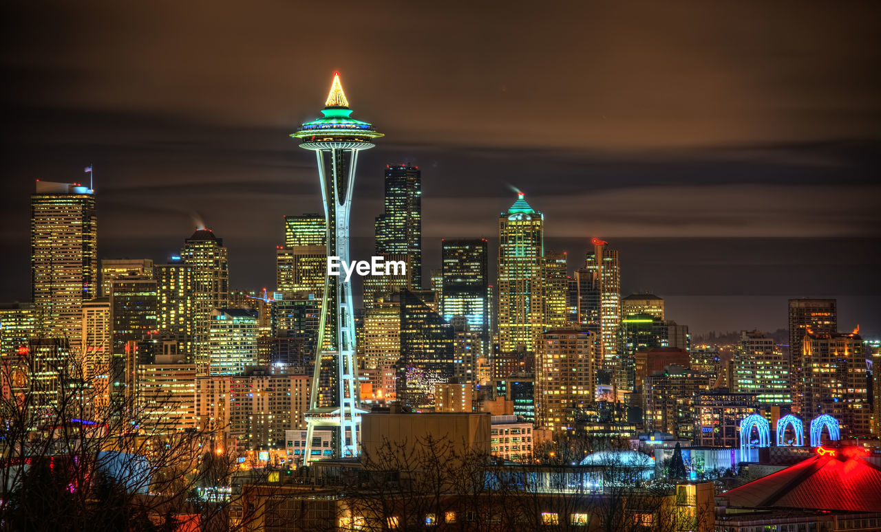 Illuminated buildings in city at night