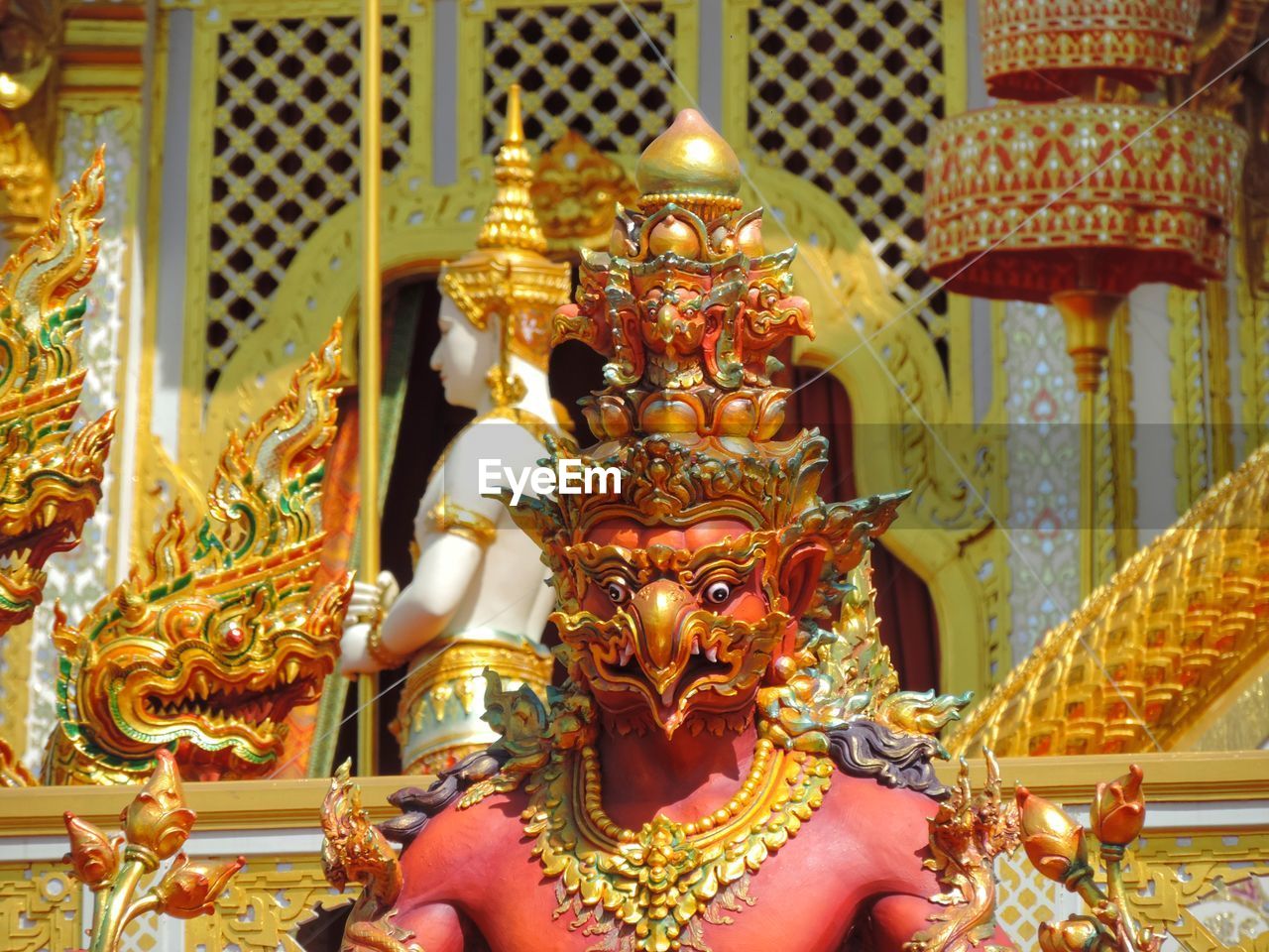 STATUE OF BUDDHA IN TEMPLE OUTSIDE BUILDING