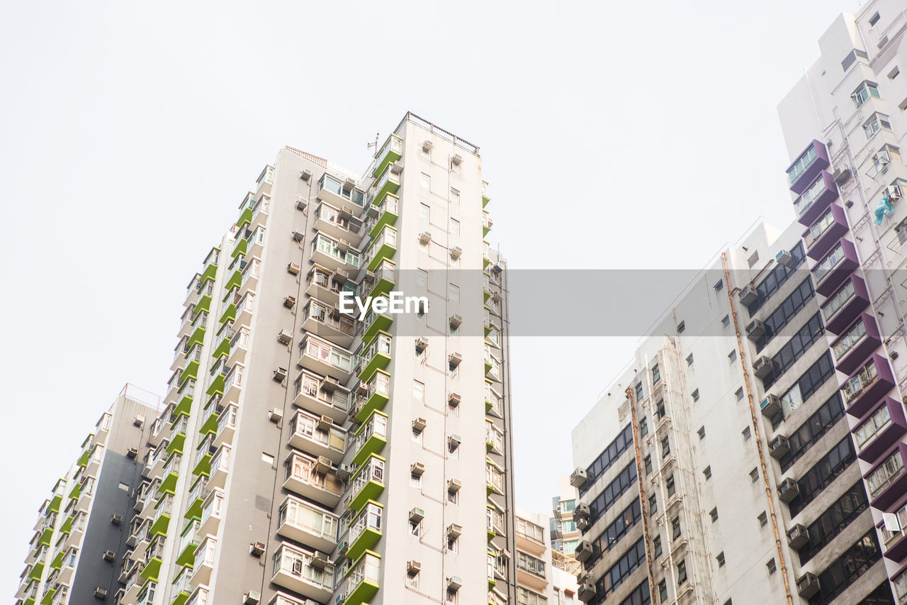 Low angle view of skyscrapers against clear sky