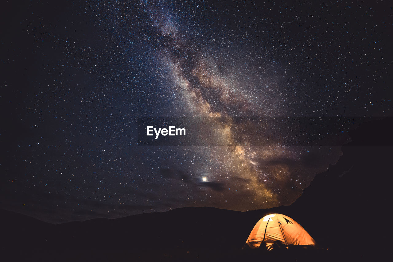 Low angle view of star field against sky at night