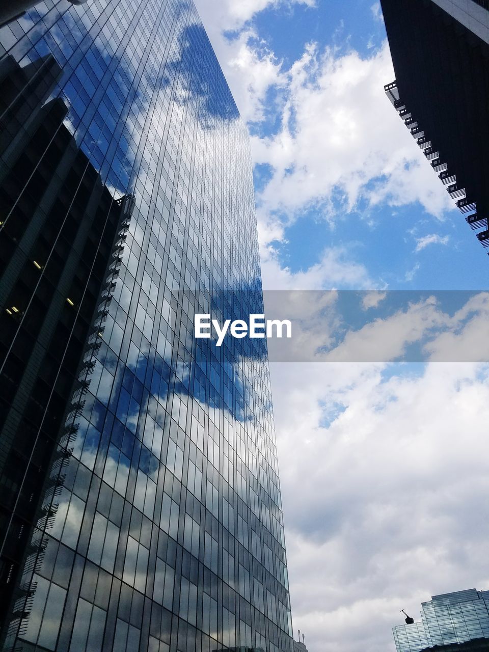 Low angle view of skyscrapers against sky