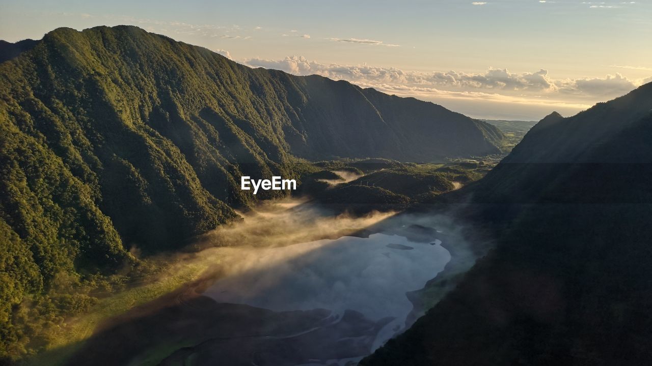 Scenic view of mountains against sky during sunset