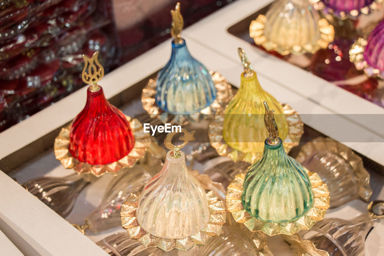 CLOSE-UP OF CHRISTMAS DECORATION HANGING ON TABLE