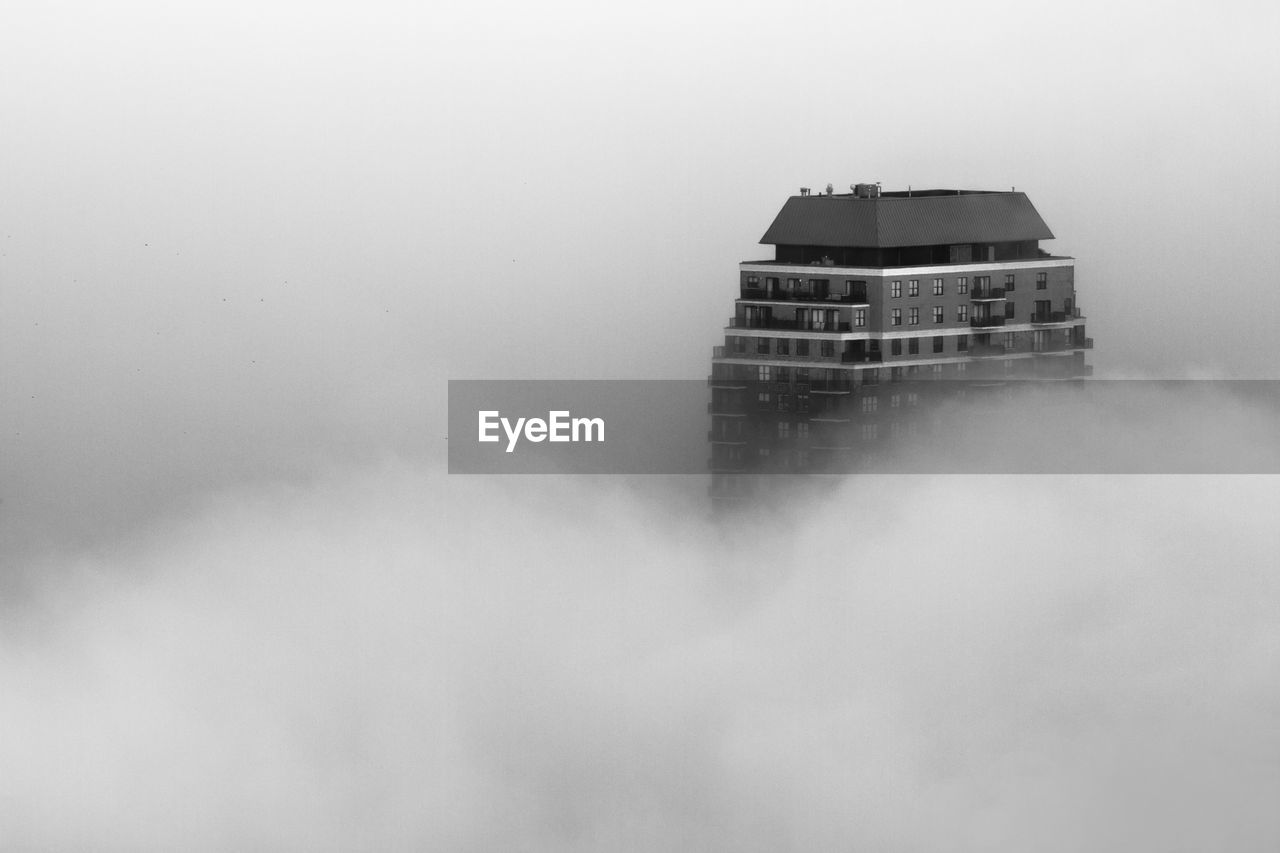 BUILDING AGAINST SKY DURING WINTER