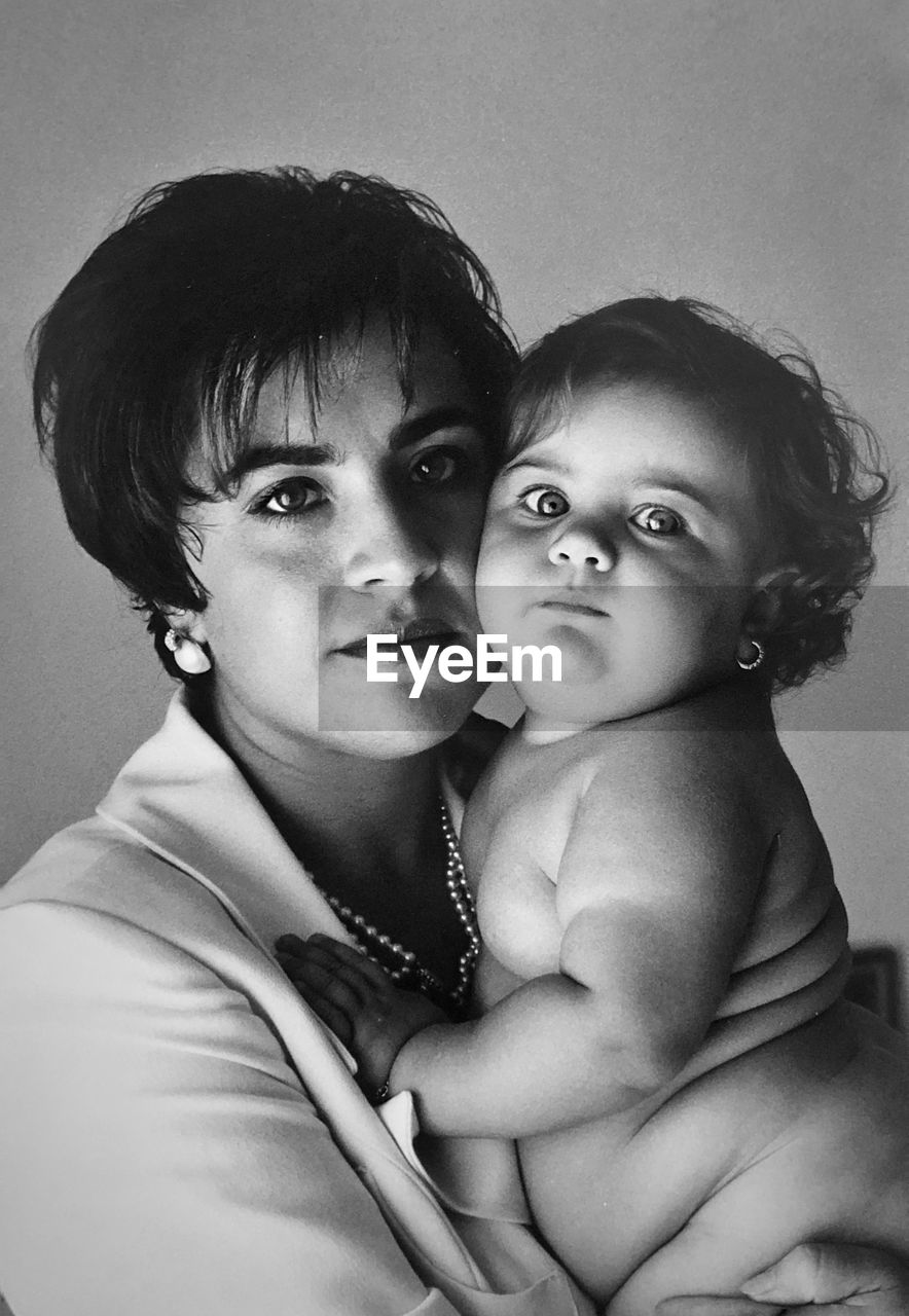 Portrait of woman with baby
