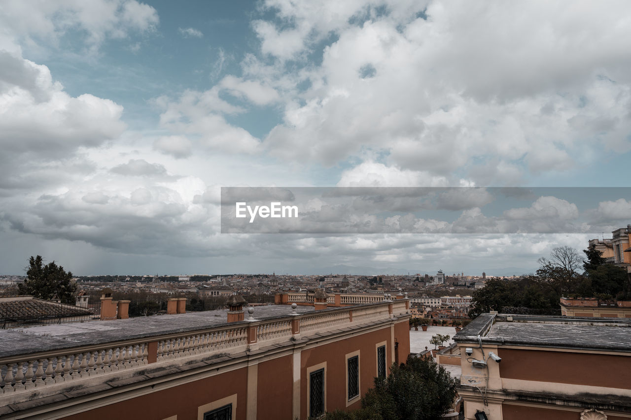 architecture, cloud, built structure, sky, building exterior, city, building, nature, no people, cityscape, travel destinations, travel, urban area, residential district, outdoors, house, tree, roof, day, high angle view, environment, tourism, plant