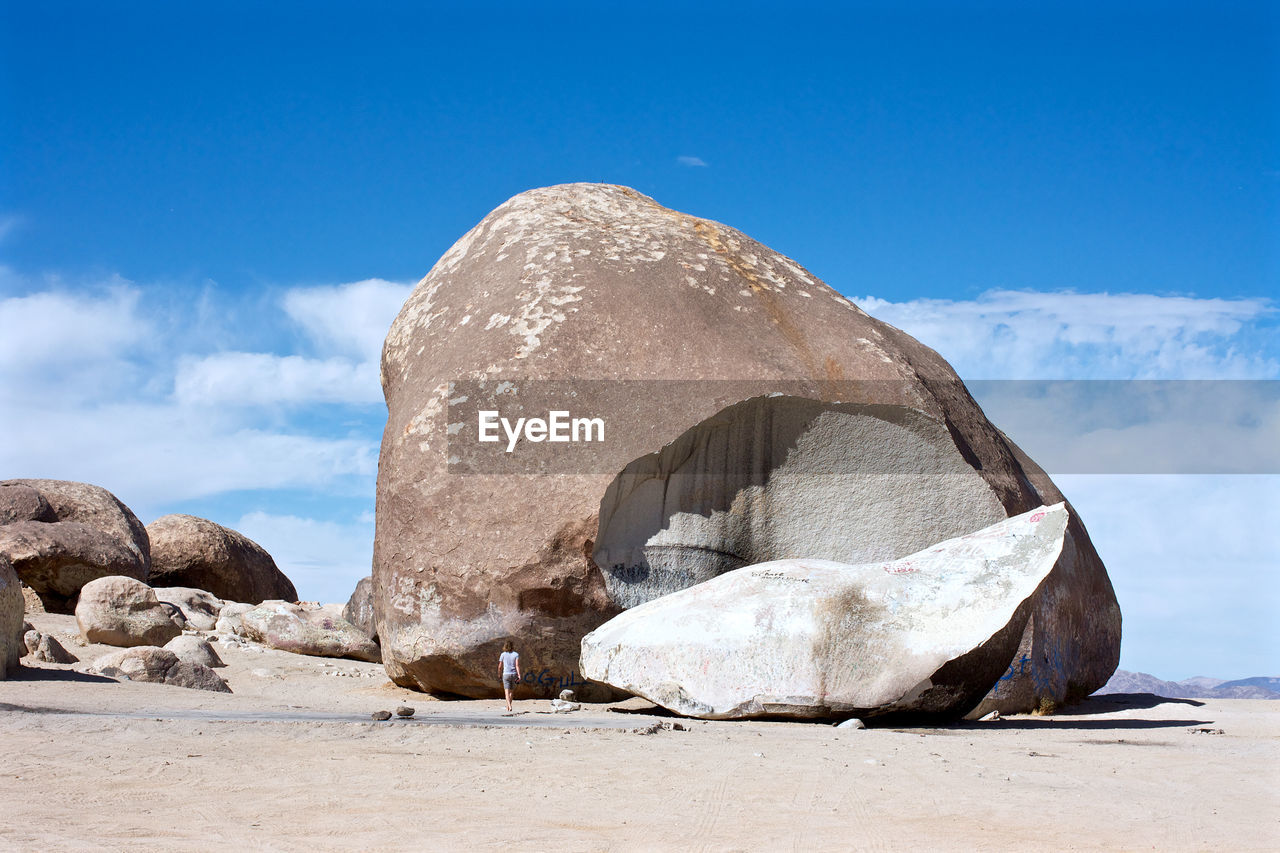 Rocks in desert against sky