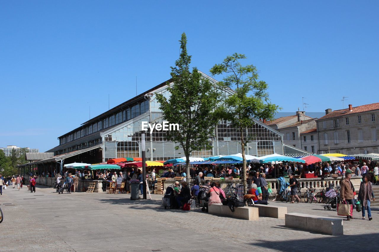 Crowd at market in city