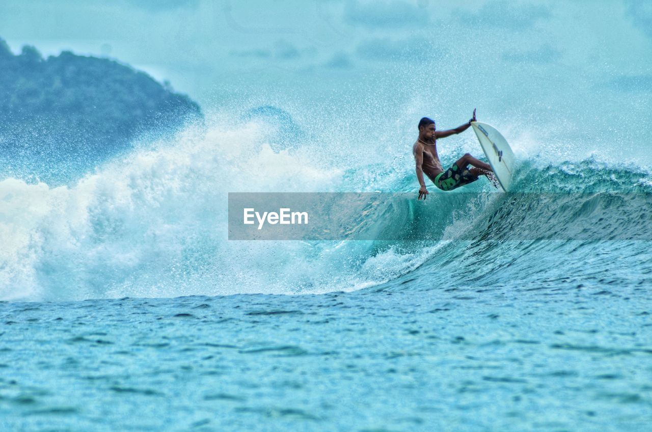 Man surfing in sea