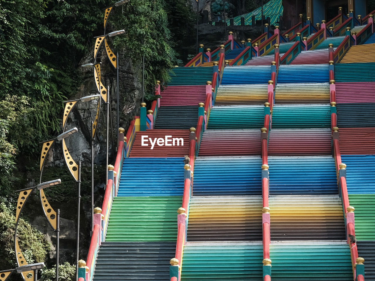 Low angle view of multi colored steps to a religious building in kuala lumpur, malaysia