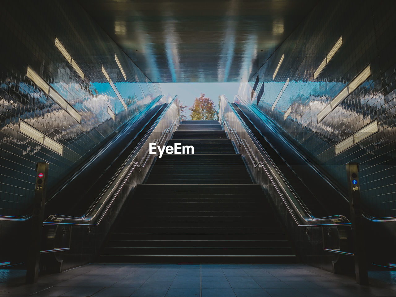 High angle view of escalator and steps in subway