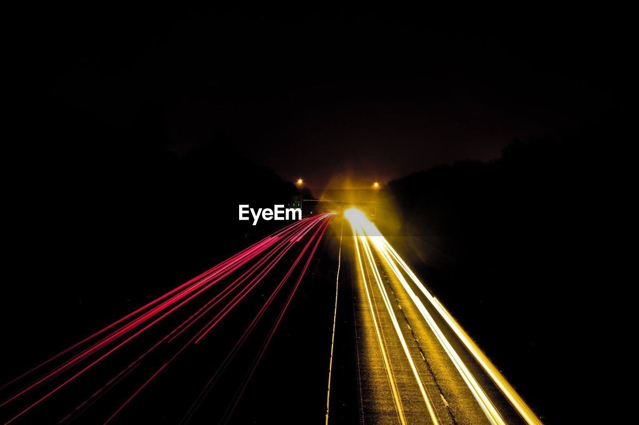 Light trails on road at night