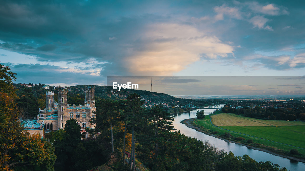 Scenic view of town against sky