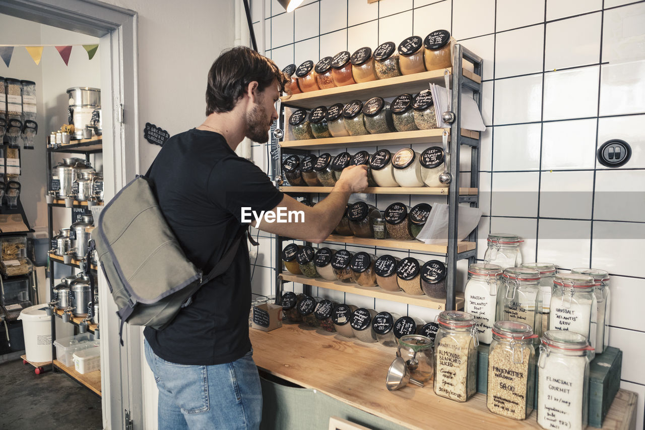 Male customer shopping at organic store