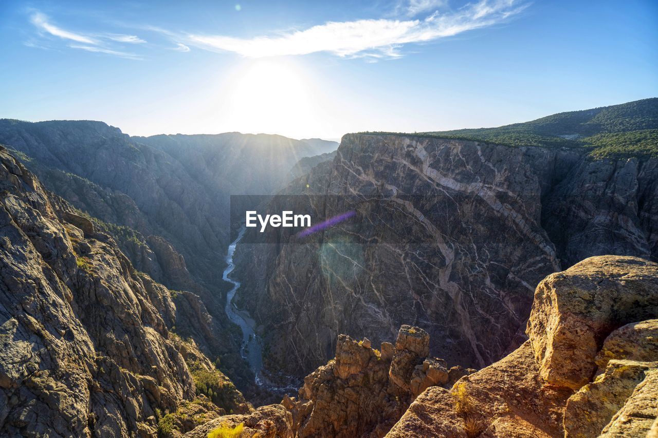 Scenic view of canyon against sky