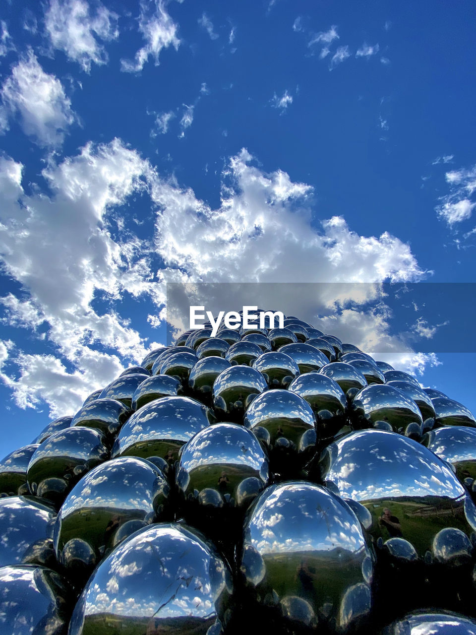 LOW ANGLE VIEW OF BLUE SKY AND CAR