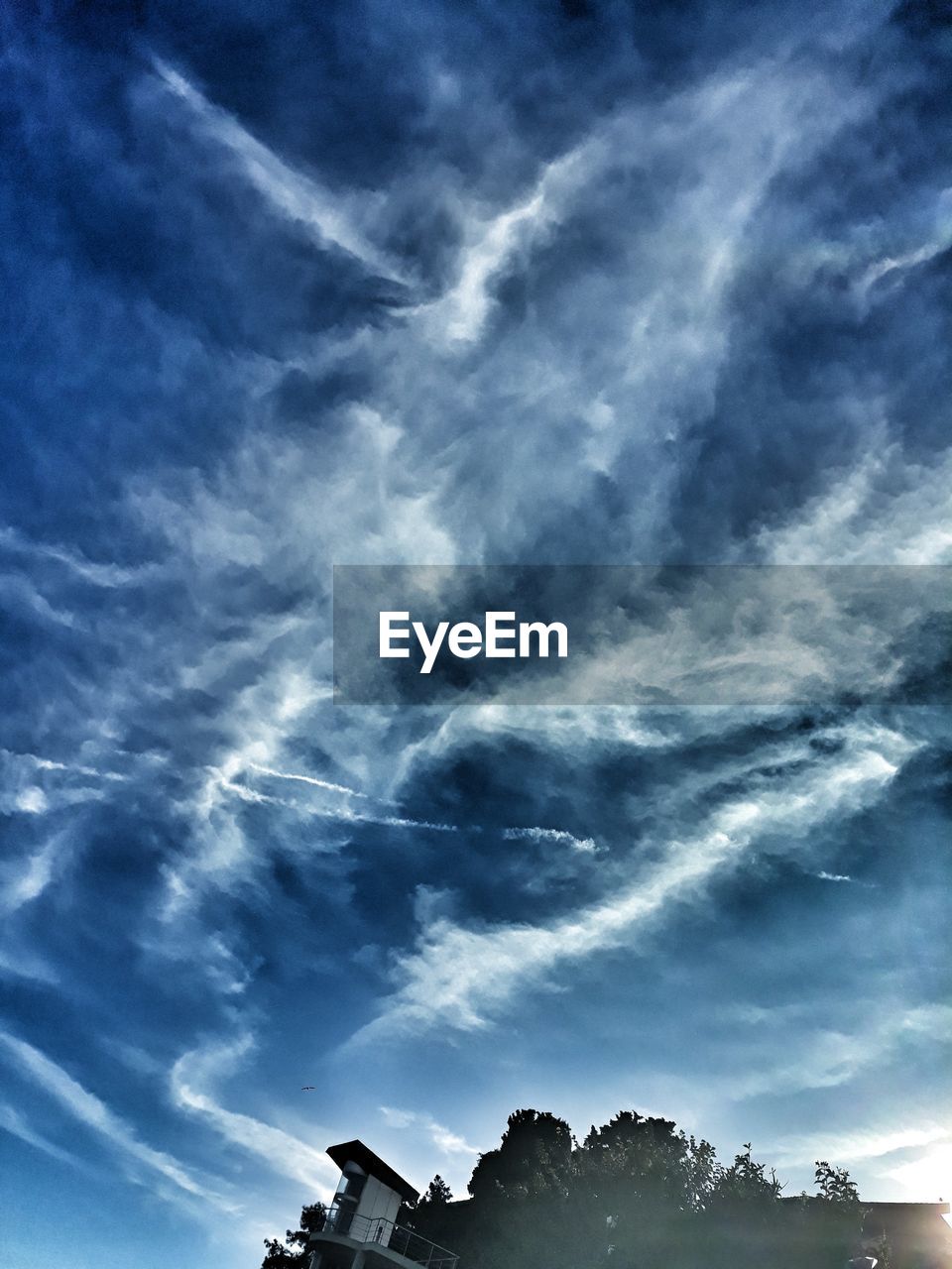 LOW ANGLE VIEW OF CLOUDS IN BLUE SKY