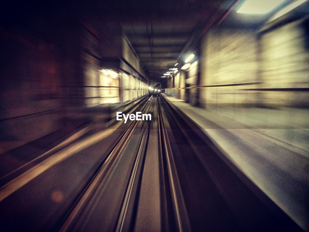 Blurred motion of railroad tracks in subway